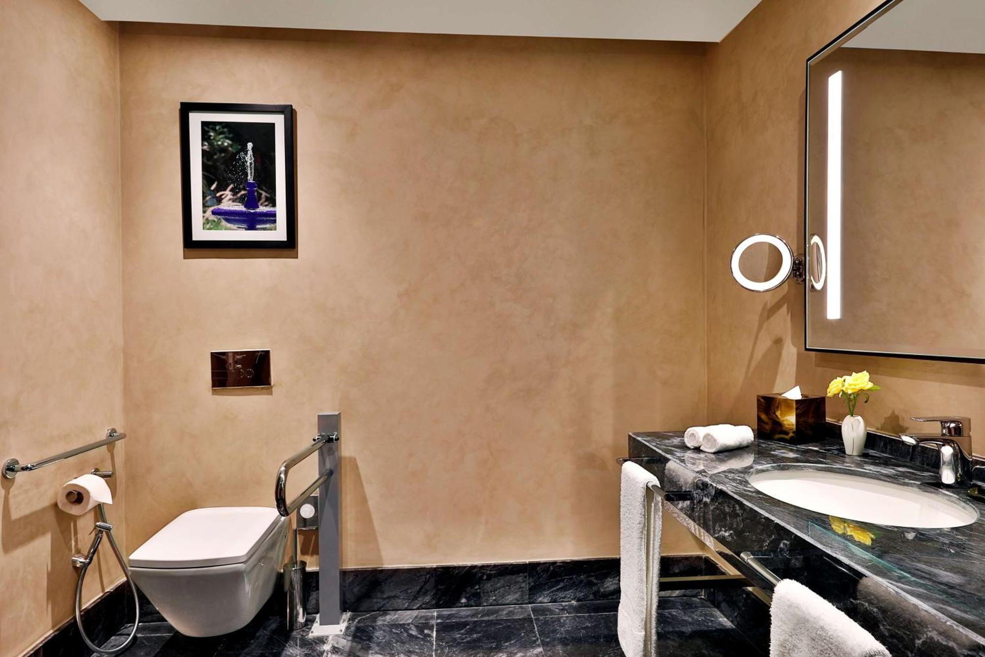 Hilton Tanger City Center Экстерьер фото A bathroom at the Taj Mahal Palace, Mumbai